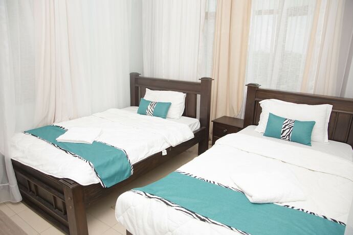 Imagen de la habitación del Hotel Sunset Paradise Holiday Homes. Foto 17