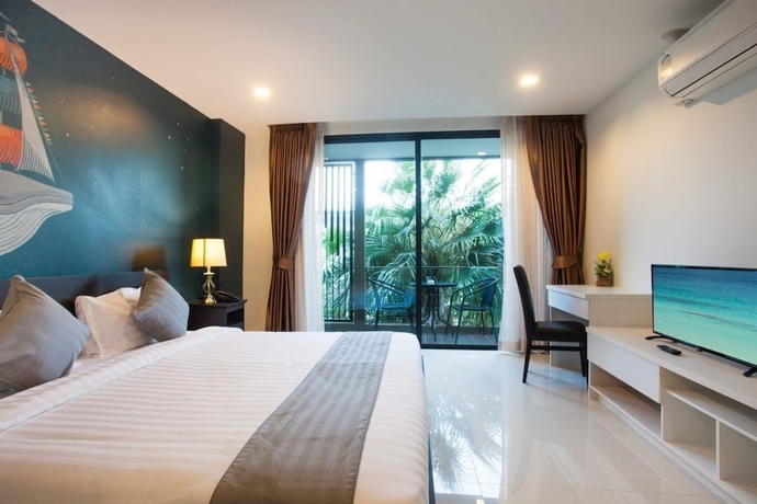 Imagen de la habitación del Hotel Sunset Seaside Beachfront. Foto 2