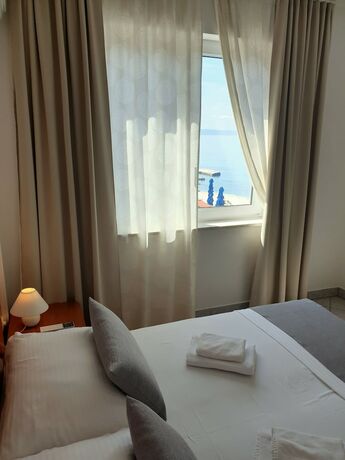 Imagen de la habitación del Hotel Sunset Split Rooms. Foto 7