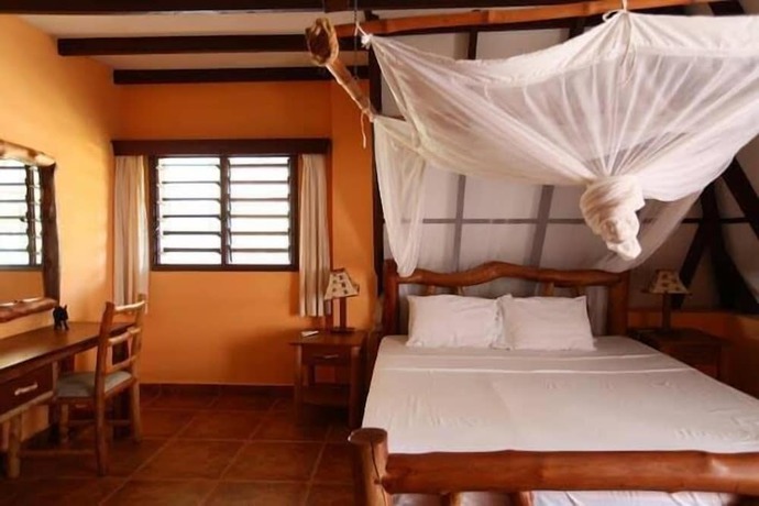 Imagen de la habitación del Hotel Sunset Villa Diani. Foto 3