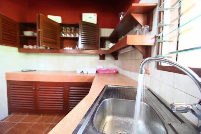 Imagen de la habitación del Hotel Sunset Villa Diani. Foto 6