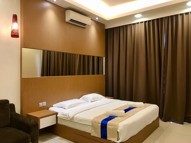 Imagen de la habitación del Hotel Sunset and Seaview Vacation Condos @ Imago Shopping Mall. Foto 7