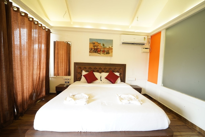 Imagen de la habitación del Hotel Sunset and Waves Resort. Foto 12
