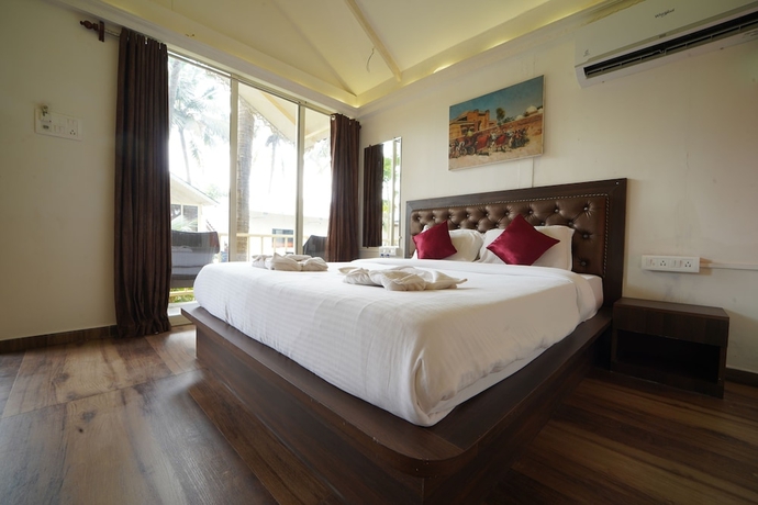 Imagen de la habitación del Hotel Sunset and Waves Resort. Foto 14