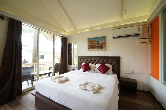 Imagen de la habitación del Hotel Sunset and Waves Resort. Foto 16