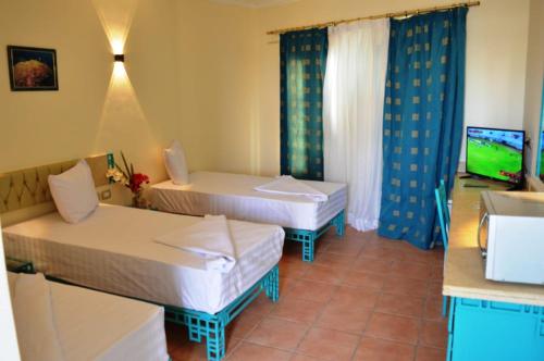Imagen de la habitación del Hotel Sunset sharm El Sheikh. Foto 14