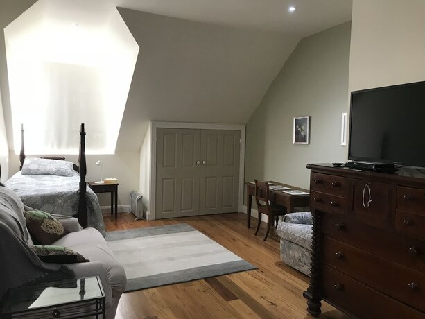 Imagen de la habitación del Hotel Sunsetcottages. Foto 21