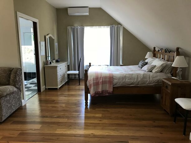 Imagen de la habitación del Hotel Sunsetcottages. Foto 22