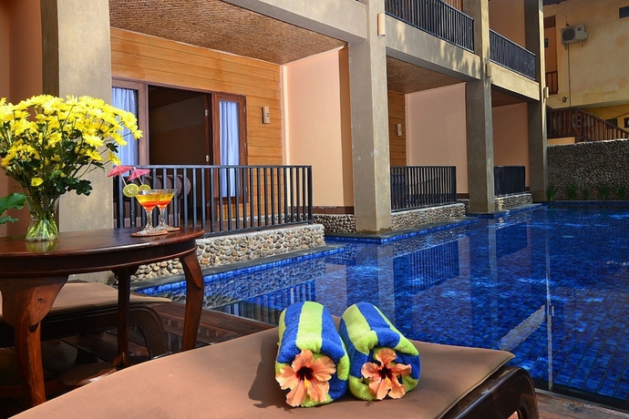 Imagen de la habitación del Hotel Sunsethouse Lombok. Foto 2