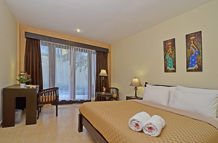 Imagen de la habitación del Hotel Sunsethouse Lombok. Foto 5