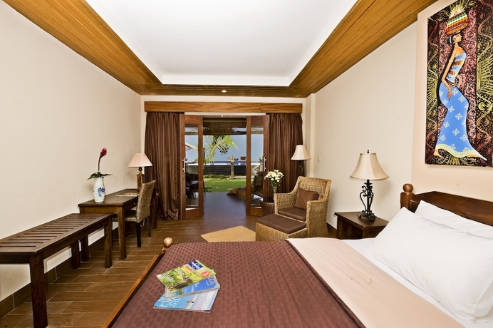 Imagen de la habitación del Hotel Sunsethouse Lombok. Foto 6
