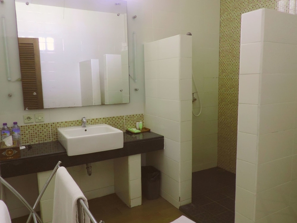 Imagen de la habitación del Hotel Sunsethouse Lombok. Foto 13