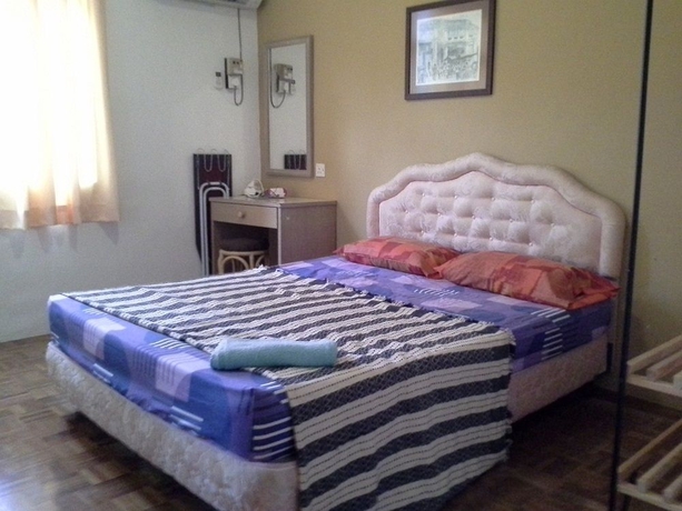 Imagen de la habitación del Hotel Sunshine Bayu Emas Apartment. Foto 4