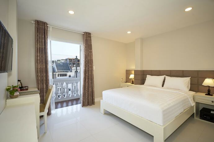 Imagen de la habitación del Hotel Sunshine Boutique Phu My Hung. Foto 12
