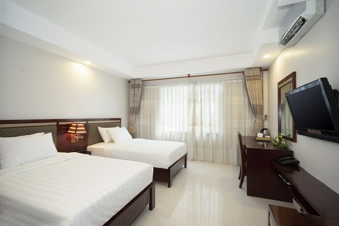 Imagen de la habitación del Hotel Sunshine Boutique Phu My Hung. Foto 16