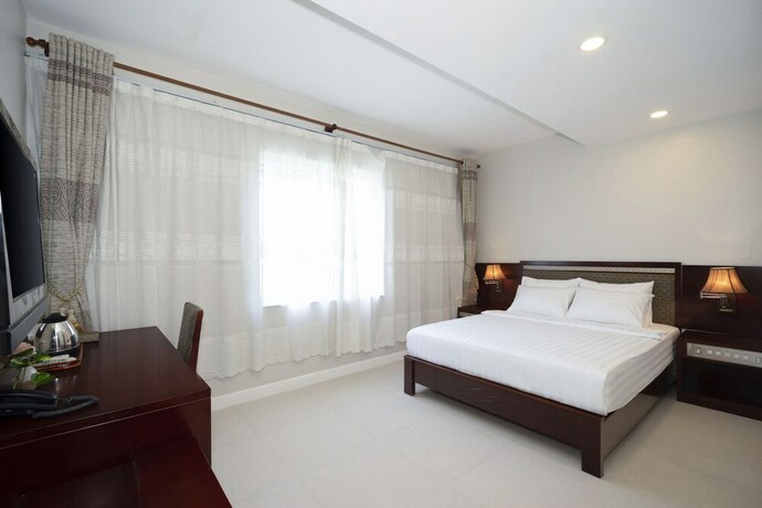 Imagen de la habitación del Hotel Sunshine Boutique Phu My Hung. Foto 19