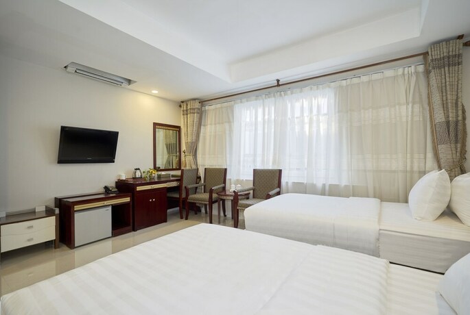 Imagen de la habitación del Hotel Sunshine Boutique Phu My Hung. Foto 22