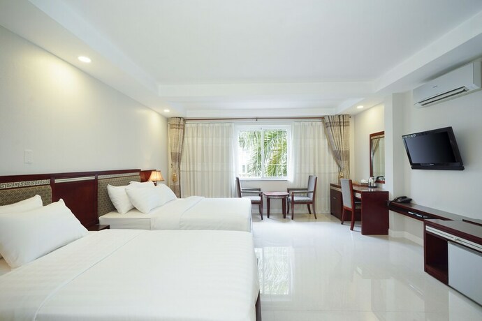 Imagen de la habitación del Hotel Sunshine Boutique Phu My Hung. Foto 26