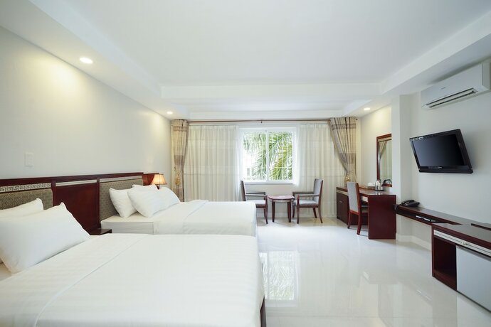 Imagen de la habitación del Hotel Sunshine Boutique Phu My Hung. Foto 32