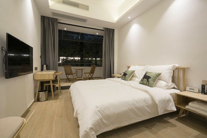 Imagen de la habitación del Hotel Sunshine, Chaozhou. Foto 22