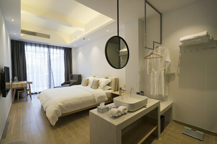 Imagen de la habitación del Hotel Sunshine, Chaozhou. Foto 28