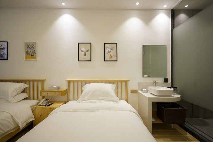Imagen de la habitación del Hotel Sunshine, Chaozhou. Foto 30