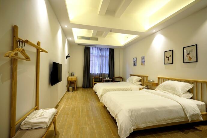 Imagen de la habitación del Hotel Sunshine, Chaozhou. Foto 31