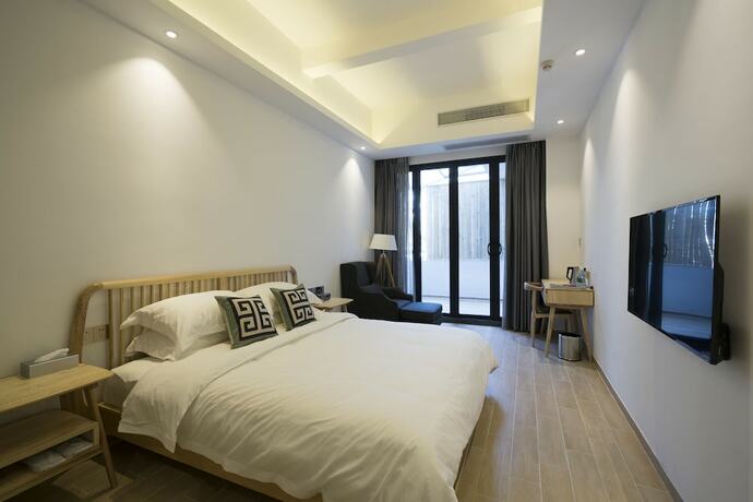 Imagen de la habitación del Hotel Sunshine, Chaozhou. Foto 32