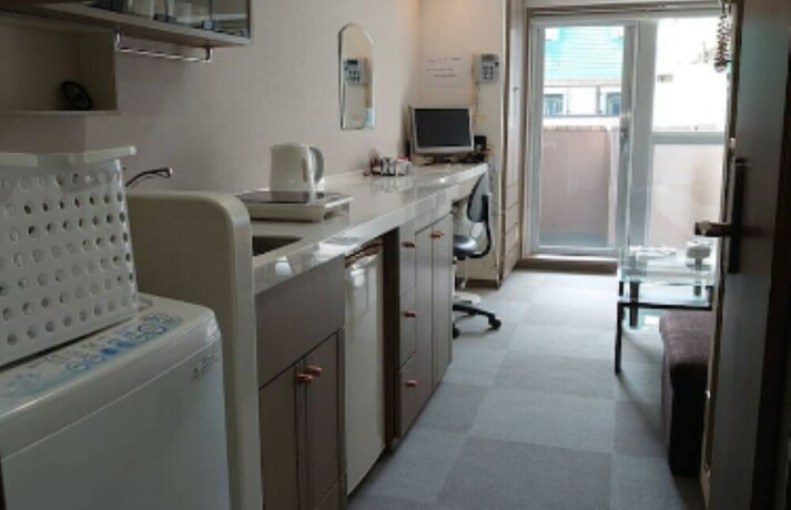 Imagen de la habitación del Hotel Sunshine City 1028. Foto 28