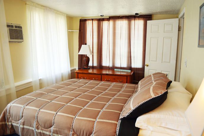 Imagen de la habitación del Hotel Sunshine Cozy Cottages. Foto 6