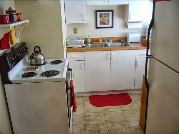 Imagen de la habitación del Hotel Sunshine Cozy Cottages. Foto 15