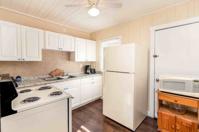 Imagen de la habitación del Hotel Sunshine Cozy Cottages. Foto 16