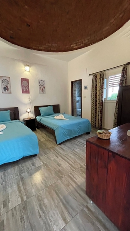 Imagen de la habitación del Hotel Sunshine Divers Club and Home. Foto 1