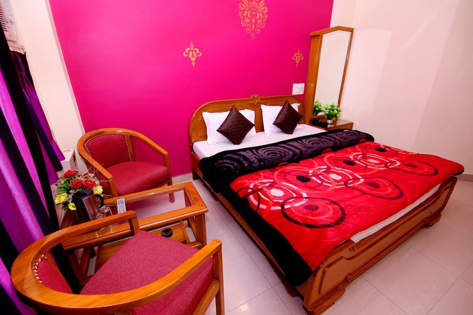 Imagen de la habitación del Hotel Sunshine, Haridwar. Foto 4