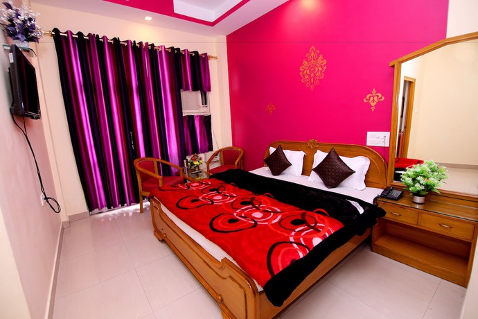 Imagen de la habitación del Hotel Sunshine, Haridwar. Foto 6
