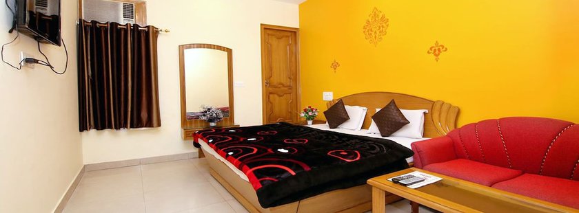 Imagen de la habitación del Hotel Sunshine, Haridwar. Foto 7