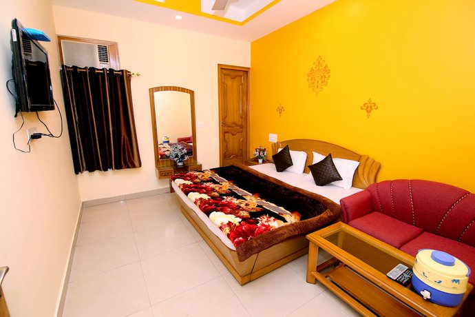Imagen de la habitación del Hotel Sunshine, Haridwar. Foto 10