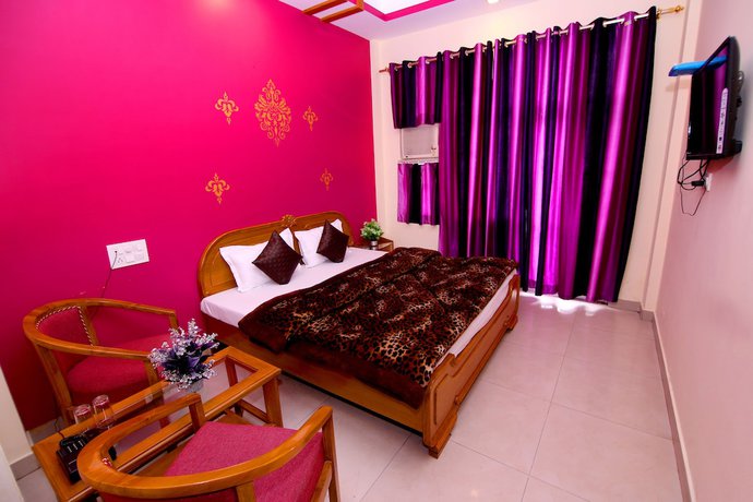 Imagen de la habitación del Hotel Sunshine, Haridwar. Foto 11