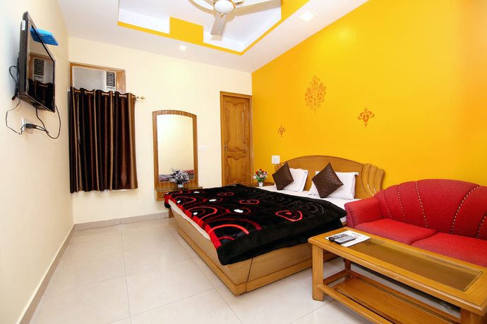 Imagen de la habitación del Hotel Sunshine, Haridwar. Foto 12