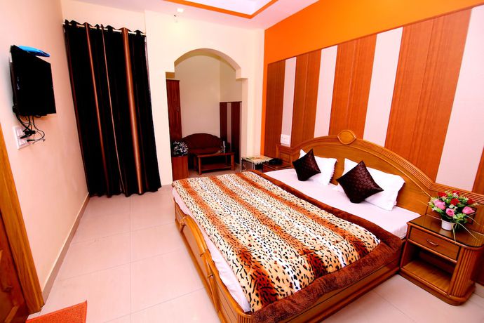 Imagen de la habitación del Hotel Sunshine, Haridwar. Foto 13