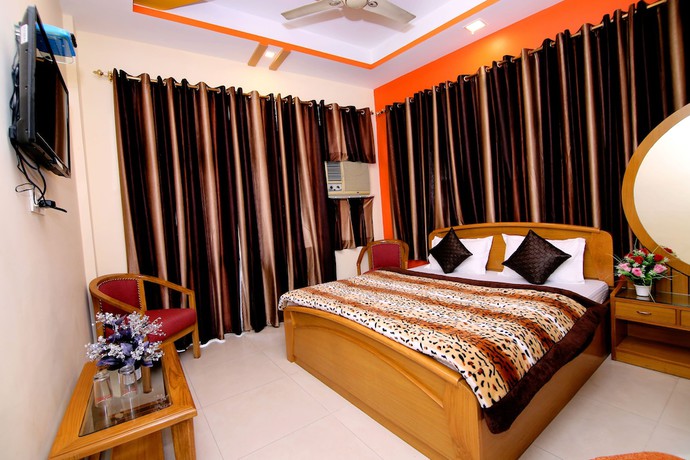 Imagen de la habitación del Hotel Sunshine, Haridwar. Foto 18