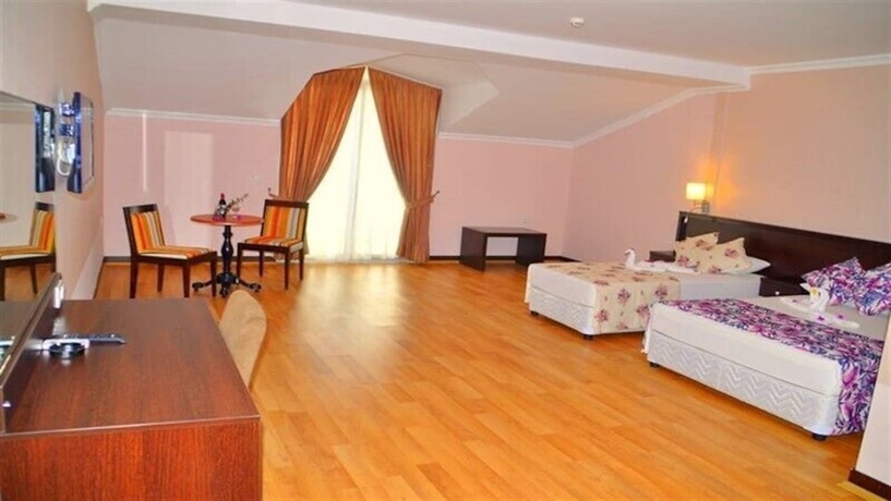 Imagen de la habitación del Hotel Sunshine Holiday Resort. Foto 3