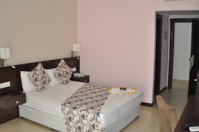 Imagen de la habitación del Hotel Sunshine Holiday Resort. Foto 6