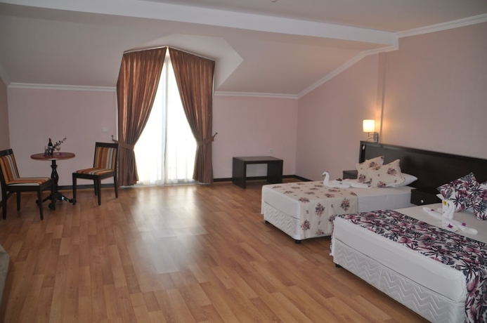 Imagen de la habitación del Hotel Sunshine Holiday Resort. Foto 11