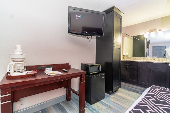 Imagen de la habitación del Hotel Sunshine Inn, Kissimmee. Foto 11