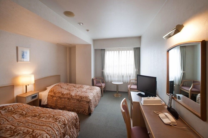 Imagen de la habitación del Hotel Sunshine Tokushima. Foto 5