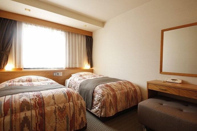 Imagen de la habitación del Hotel Sunshine Tokushima. Foto 6