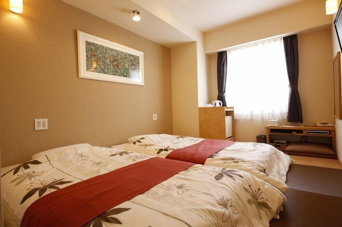 Imagen de la habitación del Hotel Sunshine Tokushima. Foto 10