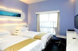 Imagen de la habitación del Hotel Sunshine Tour Hotel Guangdong. Foto 3