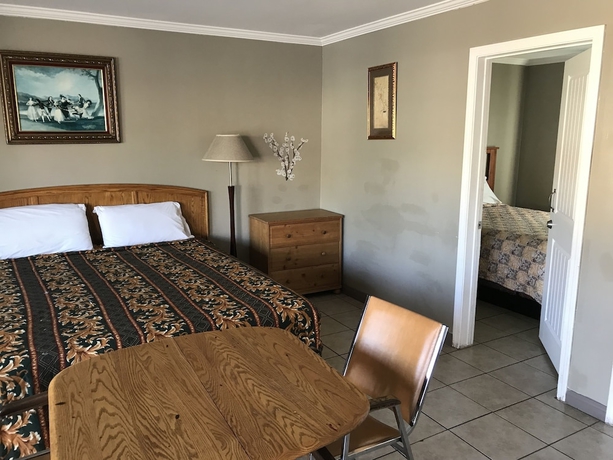 Imagen de la habitación del Hotel Sunshine Village Motel. Foto 5
